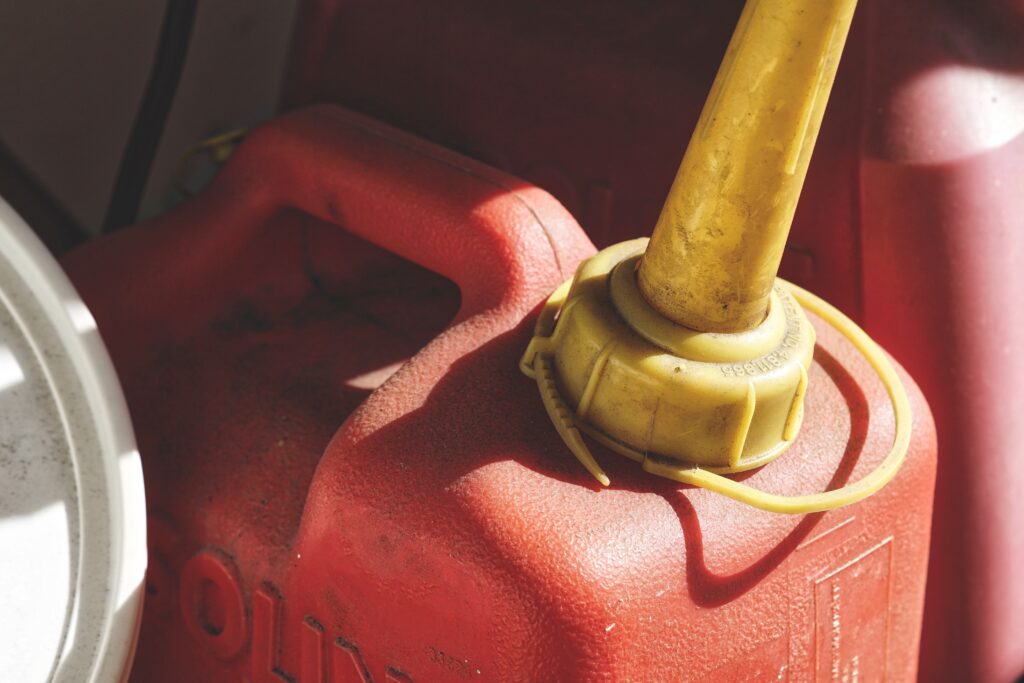 A red and yellow gas can. One of our recommended items of boondocking must haves. 